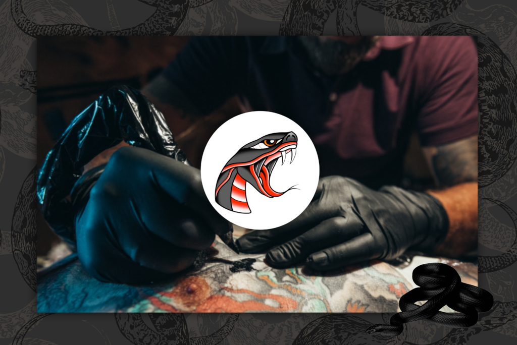 Venom portrait tattoo located on the forearm.